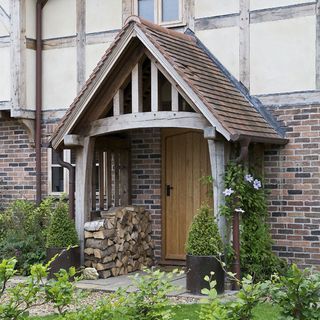 door with oak porch and plants