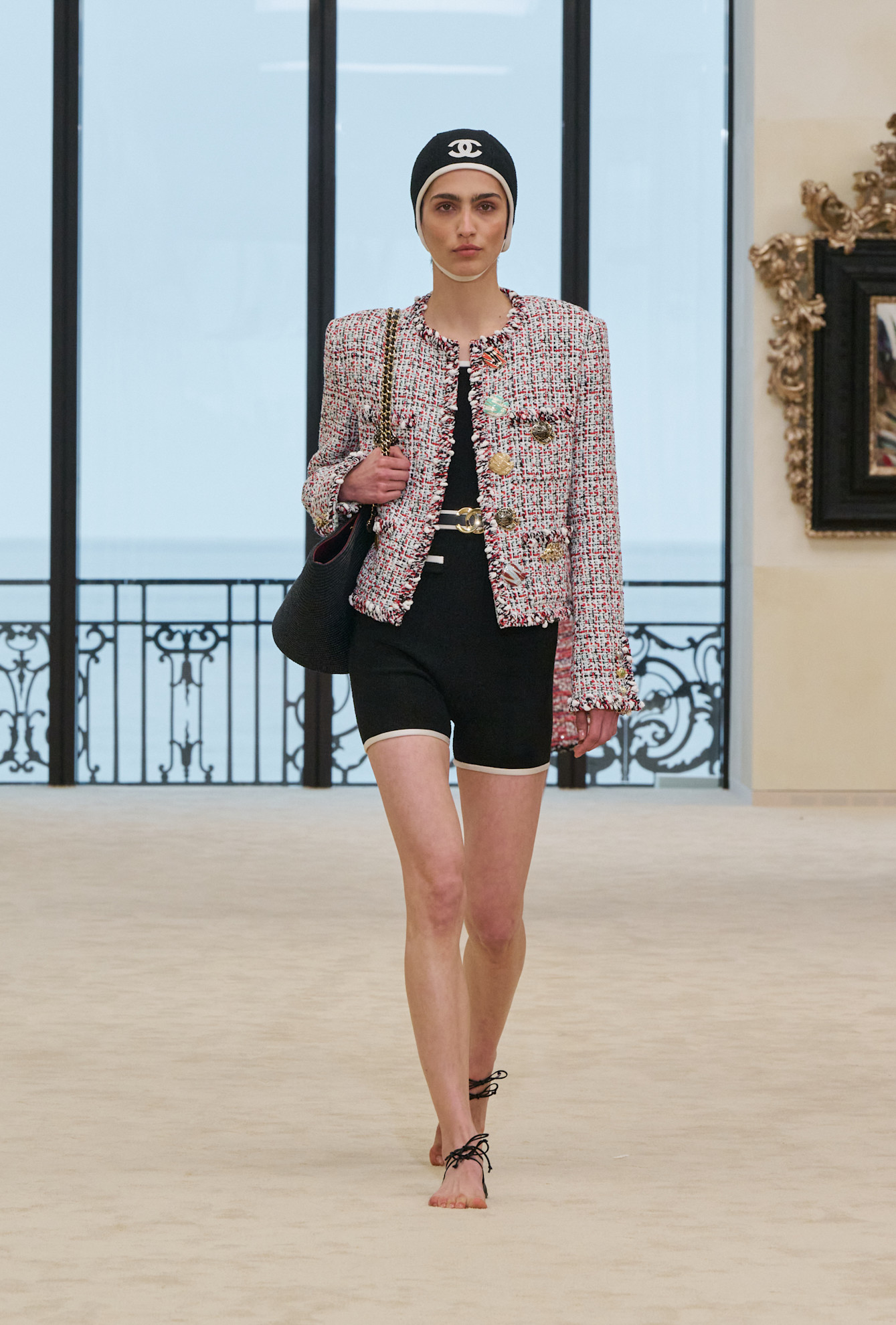 A model wore the sole-less sandals on Chanel's Cruise 2027 runway