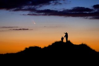 Father and Son Observe Comet PanSTARRS by Chris Cook