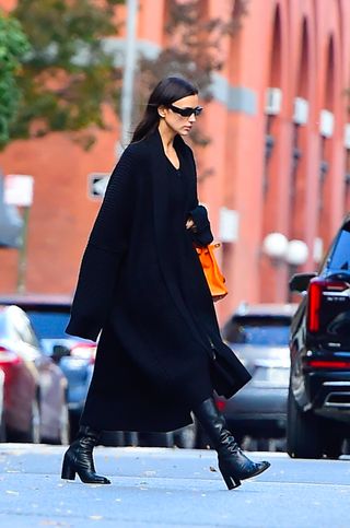 Irina Shayk in sweater coat and tabis in New york city
