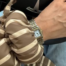 Woman wearing coat and watch from Amazon