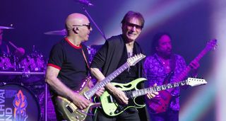 Joe Satriani and Steve Vai perform onstage during the Satch/Vai Tour.