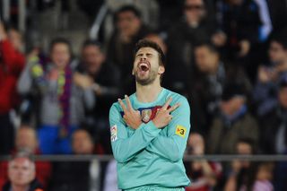 Gerard Pique celebrates a goal for Barcelona against Mallorca in March 2012.