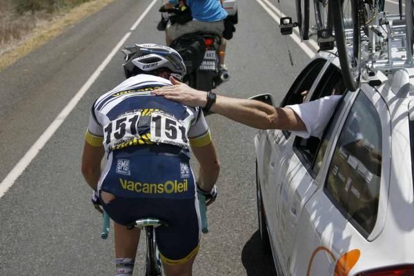 Romain Feillu (Vacansoleil-DCM) chases back on after falling.