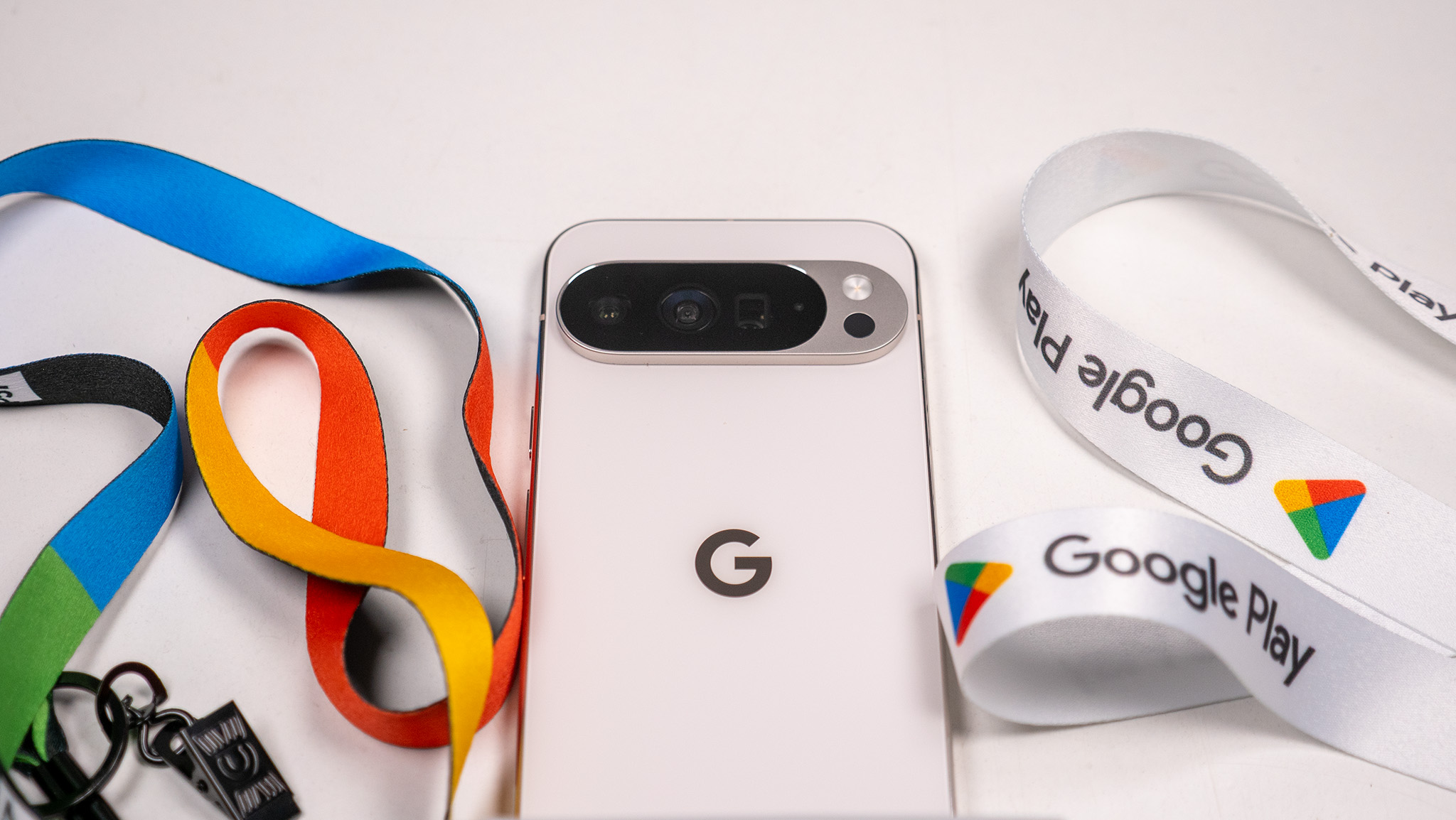 A Google Pixel 10 Pro XL with Google-branded ribons