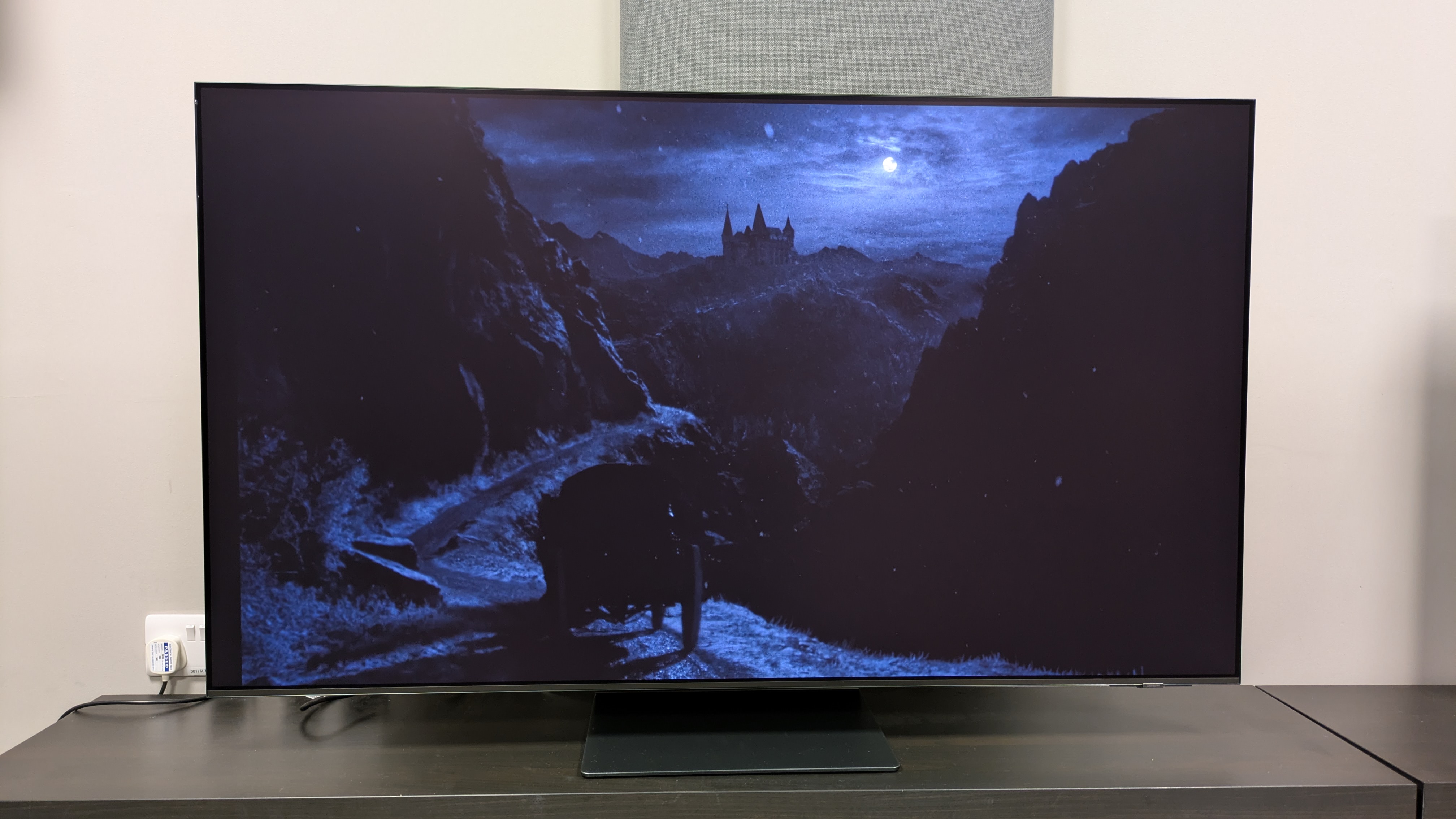 Samsung S95F in Filmmaker Mode default with Nosferatu carriage scene on screen