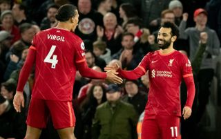 Liverpool's Virgil van Dijk and Mohamed Salah celebrate a goa | Liverpool vs Everton live stream