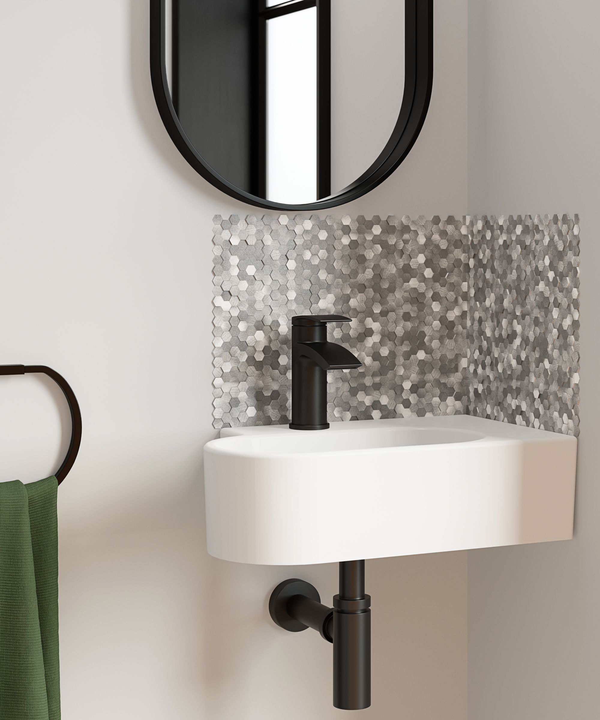 silver, grey and white mosaic tiled splashback behind small white bathroom sink with black tap