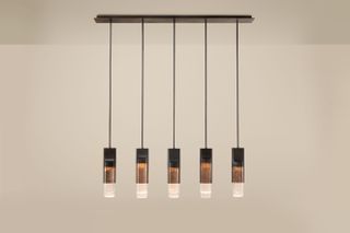 Lamp made of five hanging lights with glass cylinders