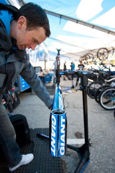 Cross country and marathon racer Oli Beckingsale works on his bike.