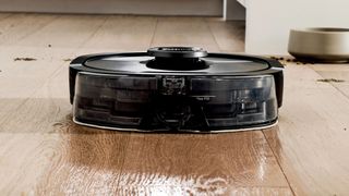 Shark AI Ultra Robot Vacuum and Mop cleaning a hardwood floor