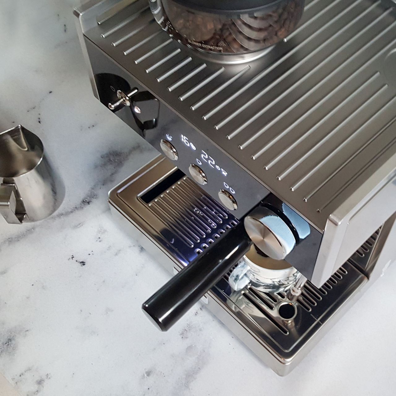 The Breville Barista Signature Espresso Machine on a grey marble worktop
