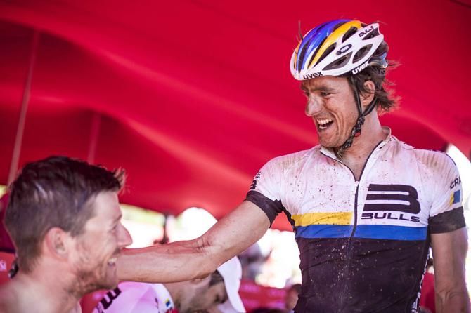 Stefan Sahm of Bulls 3 congratulates his teammate Karl Platt