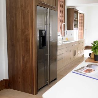 kitchen with cabinet and fridge