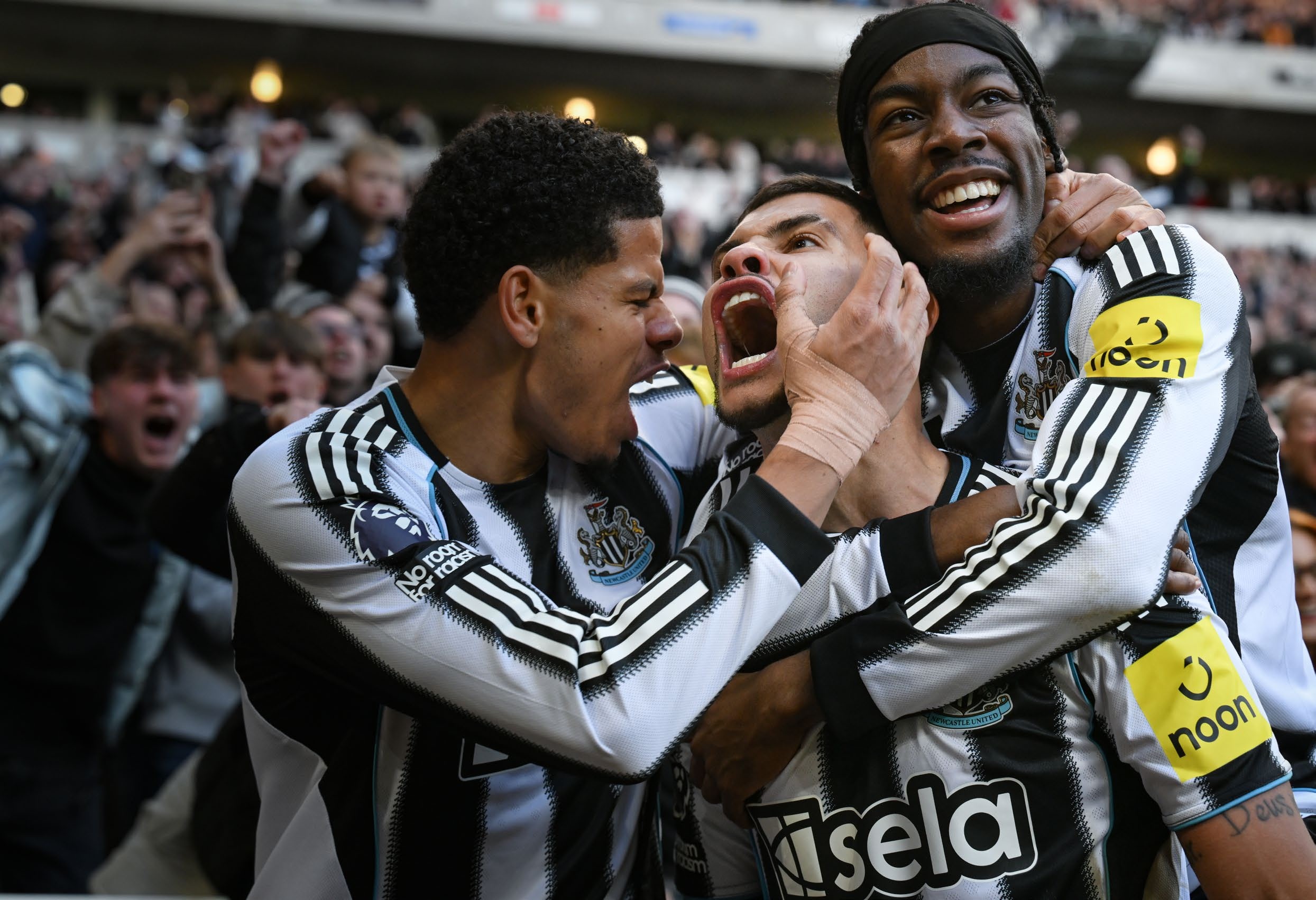 Newcastle players celebrating.