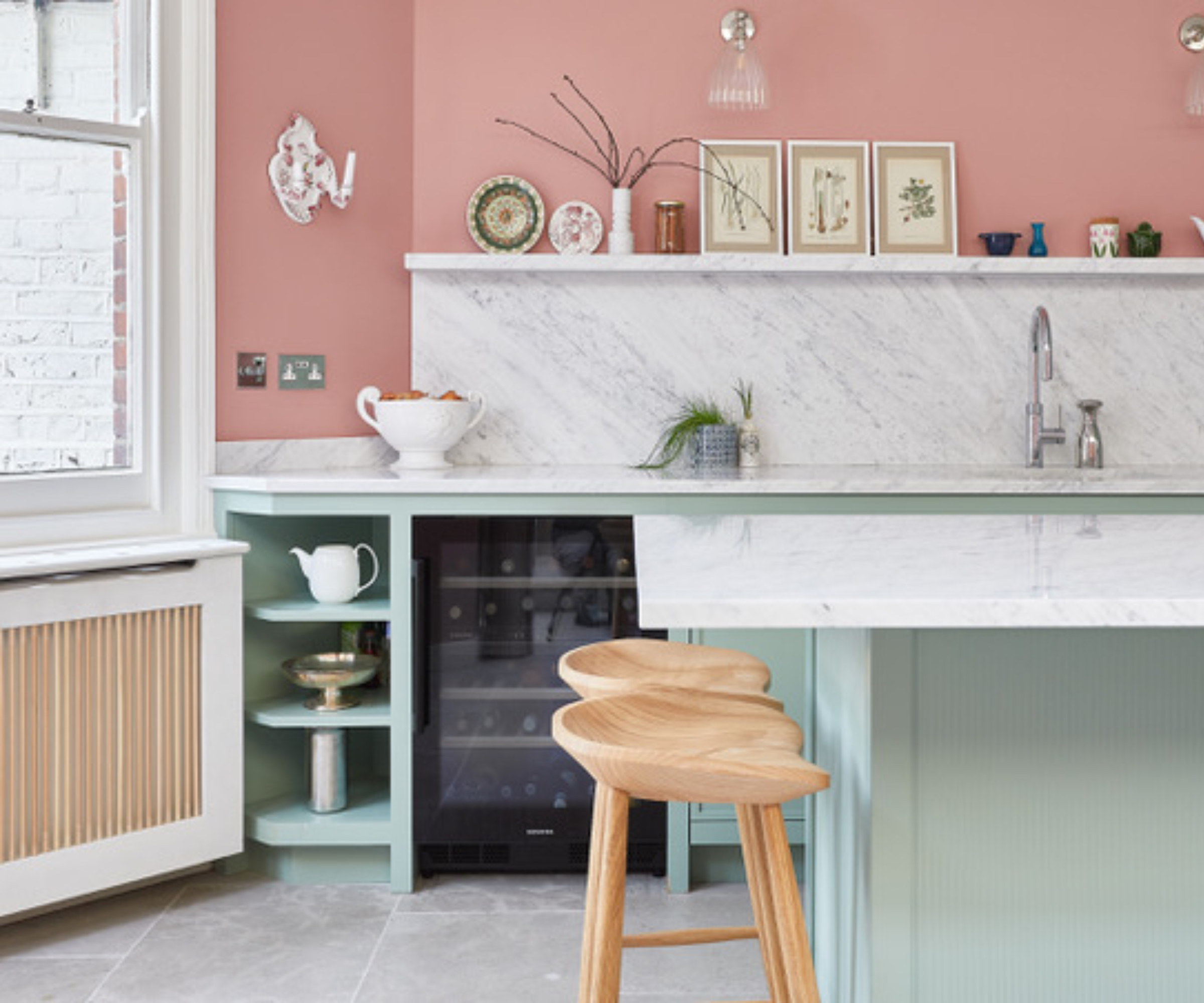 Kitchens by Holloways mint kitchen with white marble worktop and splashback