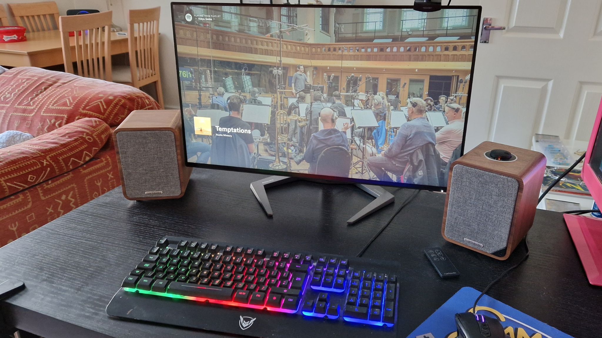 Ruark MR1 Mk2 Bluetooth Speakers review image showing both speakers on a desk beside a 27 inch monitor