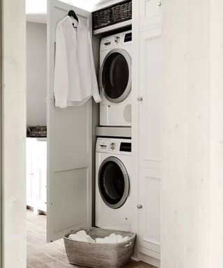 small utility room ideas - washing machine and tumble dryer in a cupboard - neptune
