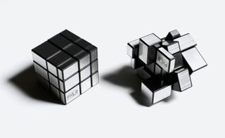  The English designer announced her London womenswear show with a diabolically difficult, all-silver riff on a Rubik’s cube