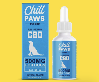 A bottle of Chill Paws CBD oil for dogs next to its blue packaging