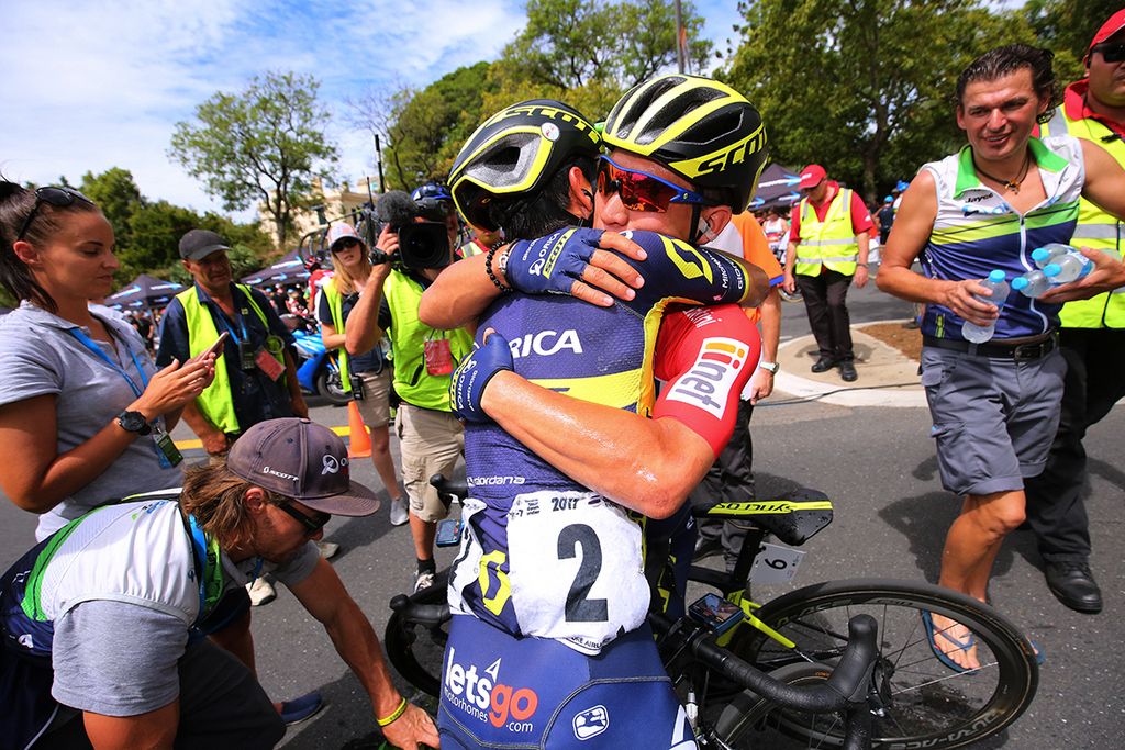 Caleb Ewan and Esteban Chaves hug it out