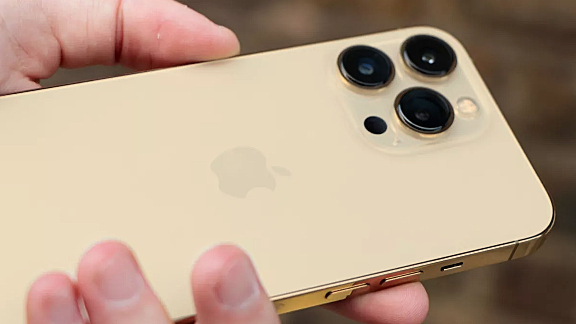 An iPhone 13 Pro photo edited to show a gold shade