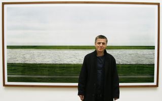 Andreas Gursky poses in front of his work 'Rhein II' (Joerg Koch/AFP/Getty Images)