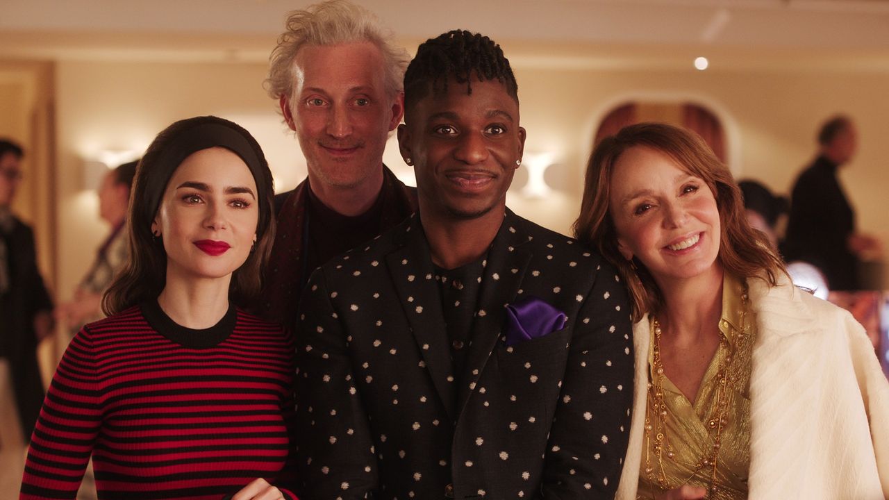 Lily Collins as Emily, Bruno Gouery as Luc, Samuel Arnold as Julien, Philippine Leroy-Beaulieu as Sylvie Grateau in episode 405 of Emily in Paris