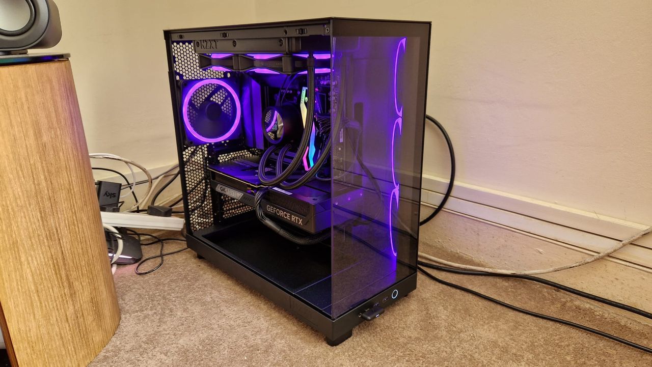 The NZXT Player Three RTX 5080 Edition showing purple lighting