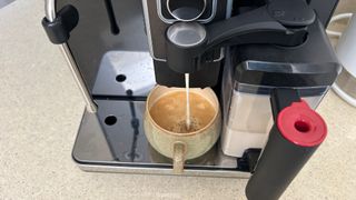 Gaggia Accademia dispensing milk