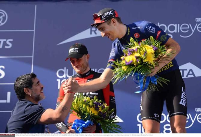 Taylor Phinney is congratulated by footballer Diego Maradonna