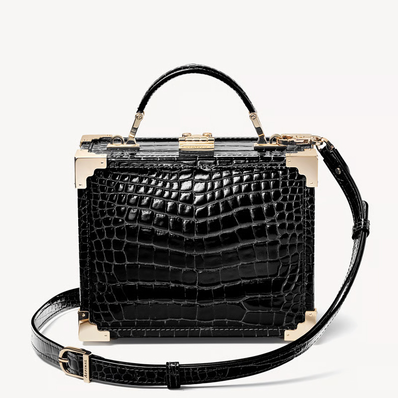 Black faux croc trunk bag from Aspinal of London