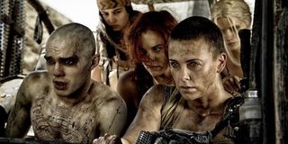 Nicholas Hoult as Nux and Charlize Theron as Furiosa in Mad Max: Fury Road