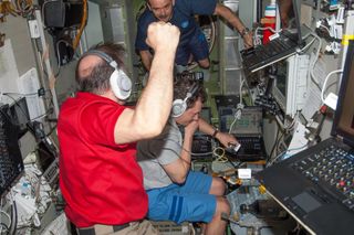 Expedition 35 Crew Celebrates Successful Cargo Craft Docking