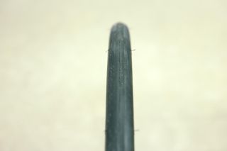 a close up of a black road bike tyre