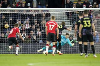 Harry Kane, centre, scores Tottenham's equaliser