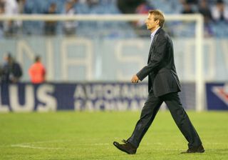 Juergen Klinsmann, headcoach of the German National Team, looks dejected after the friendly match between Slovakia and Germany at the Slovan Stadium on September 3, 2005 in Bratislava, Slovakia. (Photo by Alexander Hassenstein/Bongarts/Getty Images)