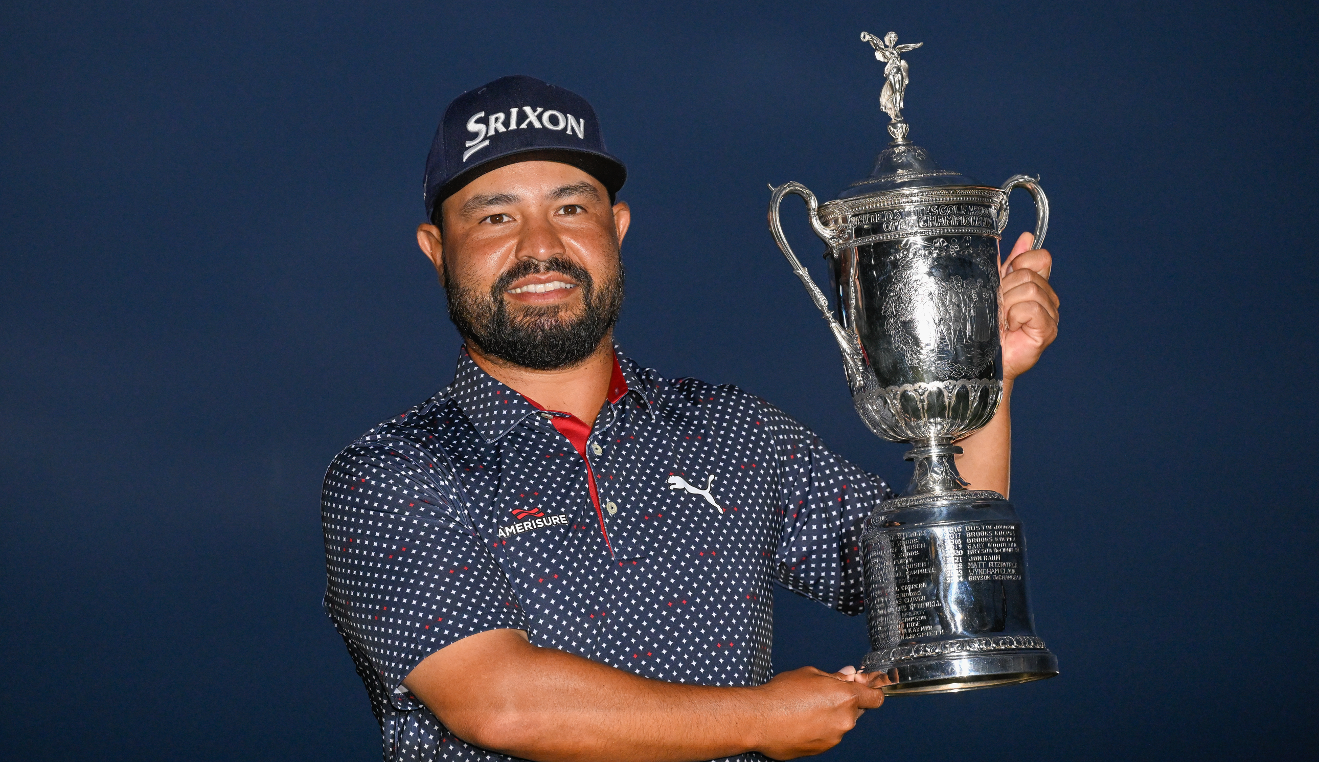 J.J. Spaun holds the US Open trophy