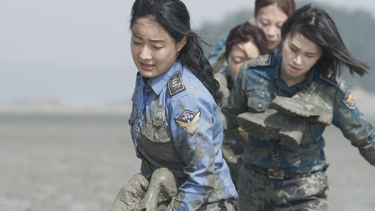 Several Siren: Survive the Island contestants in police uniforms