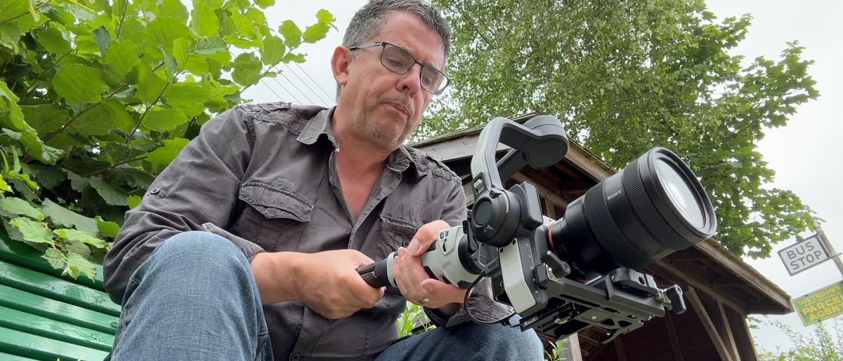 Zhiyun Cinepeer Weebill 3E gimbal being held up by a person