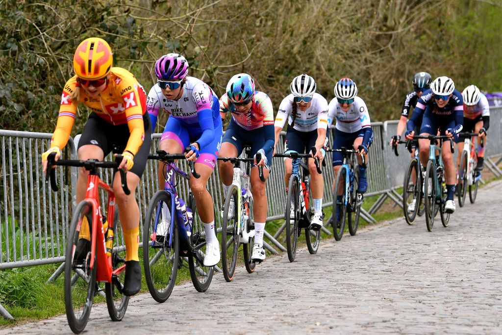 WAREGEM BELGIUM MARCH 30 LR Georgia Baker of Australia and Team BikeExchange Jayco Shari Bossuyt of Belgium and Canyon SRAM Racing Team and Lucinda Brand of Netherlands and Team Trek Segafredo during the 10th Dwars door Vlaanderen 2022 Womens Elite a 120km one day race from Waregem to Waregem DDV22 DDVwomen on March 30 2022 in Waregem Belgium Photo by Luc ClaessenGetty Images