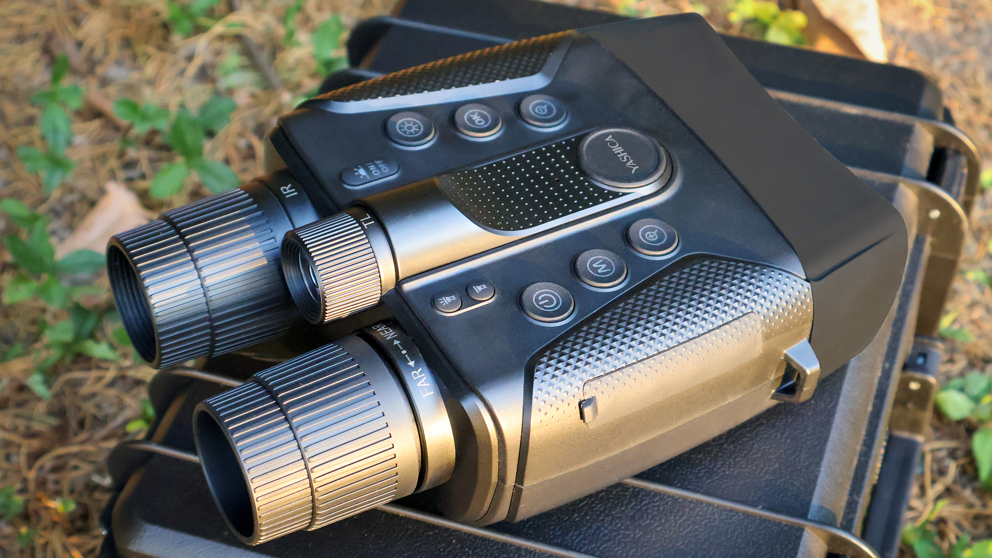 Yashica Night Vision binoculars resting on a pelicase in sunlight