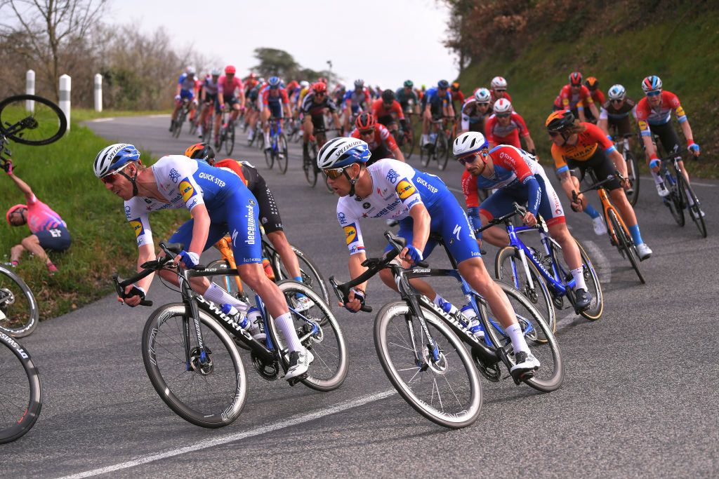 Tim Declercq (left) keeps a cool head alongside Deceuninck-QuickStep teammate Zdenek Stybar on stage 5 of the 2020 Paris-Nice, as behind them EF Pro Cycling&rsquo;s Michael Woods comes unstuck