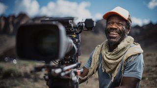 An out of focus camera next to a smiling cameraman in The Wild Ones