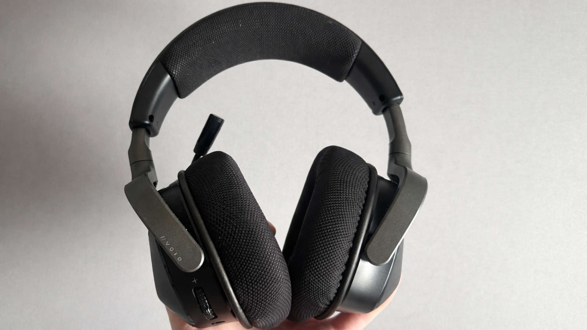 From the back, the Void V2 Max Wireless highlights its wide headband padding and fabric ear cups.