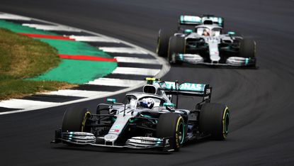 Valtteri Bottas (No.77) races against Mercedes team-mate Lewis Hamilton at the 2019 F1 British GP