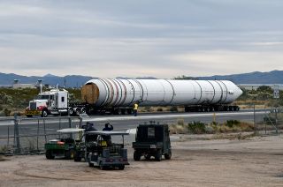A truck delivers the space shuttle solid rocket booster to the Pima Air & Space Museum in Tucson, Arizona on Dec. 29, 2016.