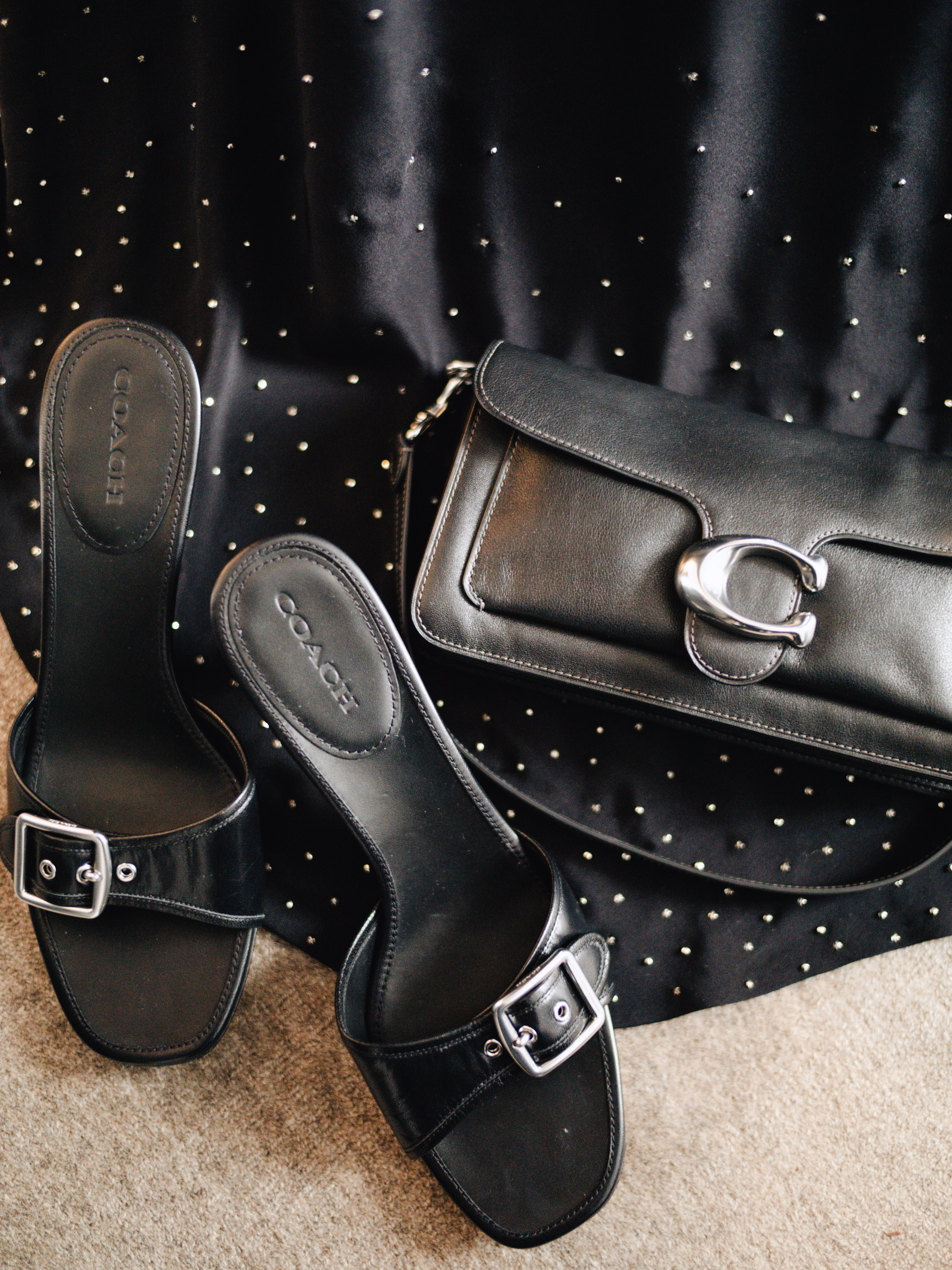 Lauren Betts gets ready for the 2026 WNBA Draft where she wore a custom Coach dress and a matching Tabby Bag
