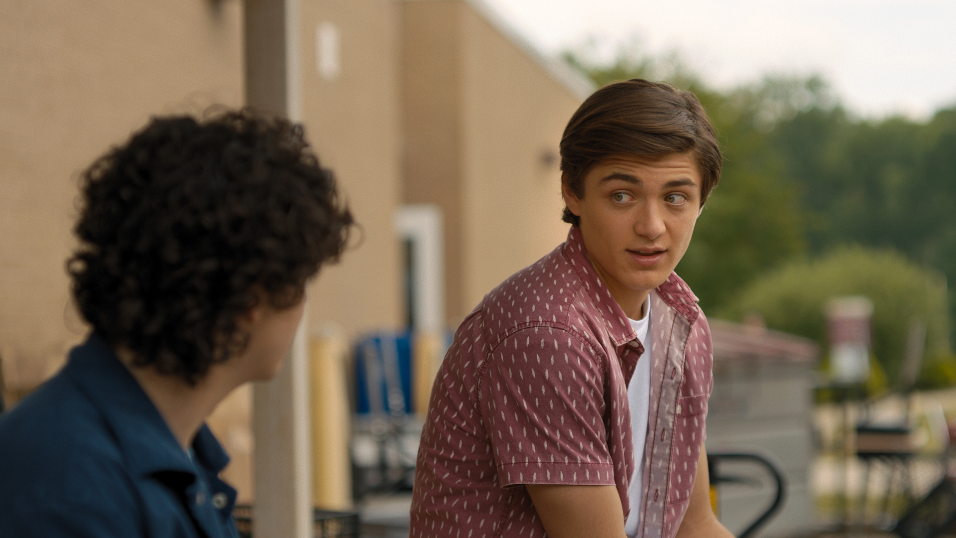 Billy and Freddy chat outside of school in Shazam! Fury of the Gods