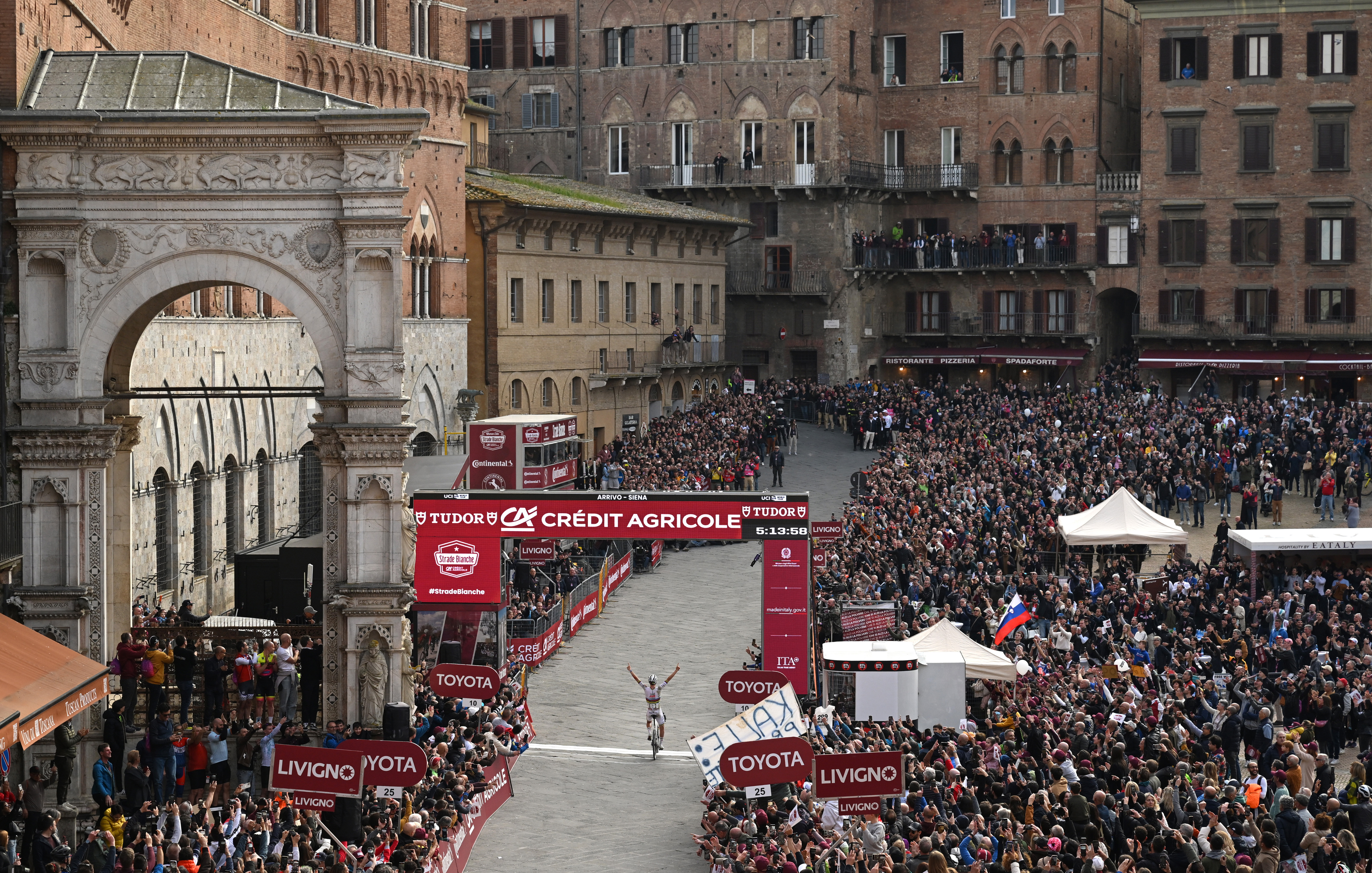 SIENA, ITALY - MARCH 08: Tadej Pogacar of Slovenia and UAE Team Emirates-XRG celebrates at finish line as race winner competes during the 19th Strade Bianche 2025, Men's Elite a 213km one day race from Siena to Siena 320m / #UCIWT / on March 08, 2025 in Siena, Italy. (Photo by Dario Belingheri/Getty Images)